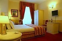 Hotel Capitolium - Town House Suite Hotel