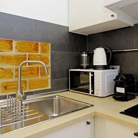 Апартаменты Delizioso Loft All'esquilino *